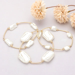 Flat pearls and gold bars bracelet