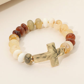 At the cross bracelet