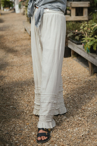 Pinstripe ruffle pants